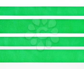 set of green satin strips isolated on white background