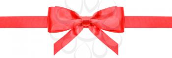 narrow red satin ribbon with symmetric bow with vertical cut ends isolated on white background