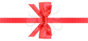 symmetric red satin bow with vertically cut ends on narrow ribbon isolated on white background