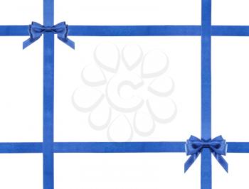 two blue satin bows and four intersecting ribbons isolated on horizontal white background