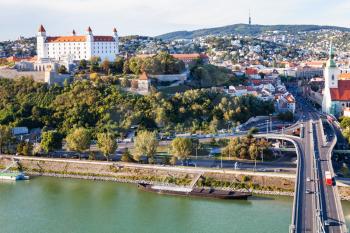 travel to Bratislava city - view of Danube waterfront, SNP bridge and panorama of Bratislava city