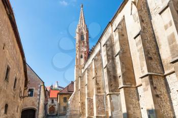 travel to Bratislava city - stone houses, Convent of the Order of St Clare Nuns (Poor Clares) on Farska street and Castle on hill in Bratislava
