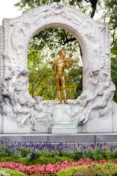 travel to Vienna city - golden monument of Johann Strauss in Stadtpark (City Park) Vienna, Austria