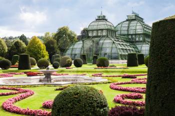 travel to Vienna city - Palmenhaus pavilion, large greenhouse in garden of Schloss Schonbrunn palace, Vienna, Austria