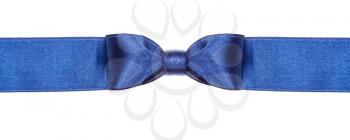 symmetric blue satin bow knot on wide ribbon isolated on white background