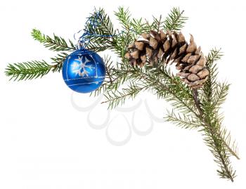 detail of christmas frame - branch of spruce tree with cone and blue ball on white background