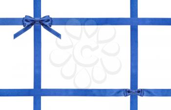 blue satin bow and knot and four intersecting ribbons isolated on horizontal white background