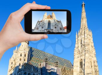 travel concept - tourist snapshot of Stephansdom (St. Stephen's Cathedral) in Vienna on smartphone
