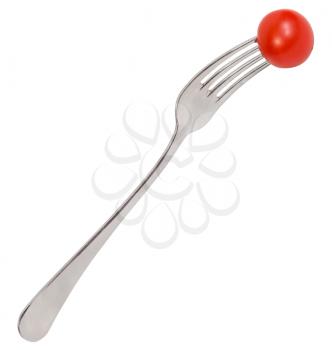 dinning fork with one fresh red cherry tomato isolated on white background