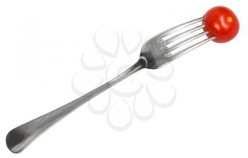 dinning fork with impaled cherry tomato isolated on white background