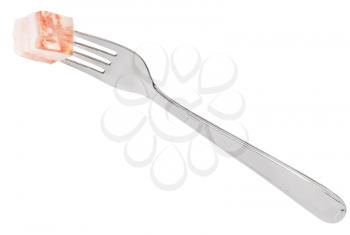 dinning fork with piece of lard isolated on white background