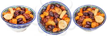 set of traditional ceramic bowls with Central Asian dried fruits isolated on white background