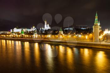 night panorama of Kremlin embankment, Moskva River in Moscow
