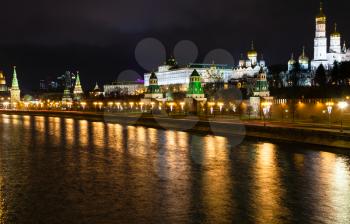 skyline with Kremlin, embankment, Moskva River in Moscow in night