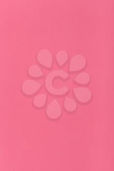 vertical background from dark pink colored sheet of paper