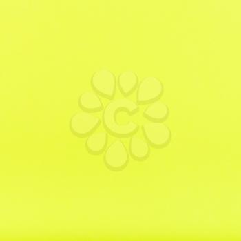 square background from lemon yellow colored sheet of paper