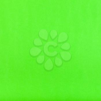 square background from green colored sheet of paper