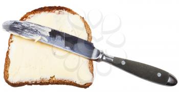 grain bread and butter sandwich with table knife isolated on white background