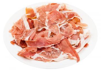 thin sliced dry-cured ham on white plate isolated on white background