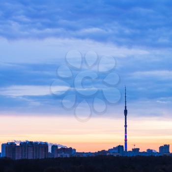 Early blue sunrise and cityscape with TV tower in winter morning, Moscow, Russia