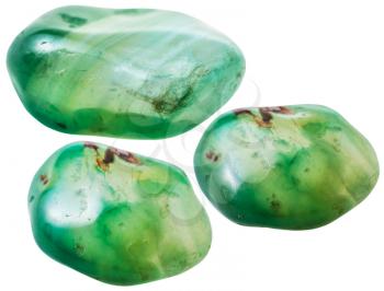 natural mineral gem stone - three green toned agate gemstones isolated on white background close up