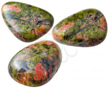 natural mineral gem stone - three Unakite gemstones isolated on white background close up