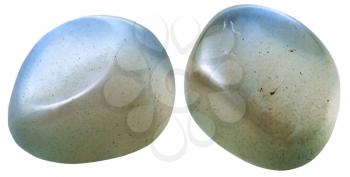 natural mineral gem stone - two Moonstone (adularia, adular) gemstones isolated on white background close up