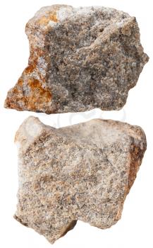 macro shooting of specimen natural rock - two pieces of quartzite mineral stone isolated on white background