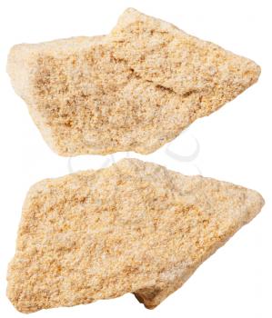 macro shooting of specimen natural rock - two pieces of sandstone (arenite) mineral stone isolated on white background