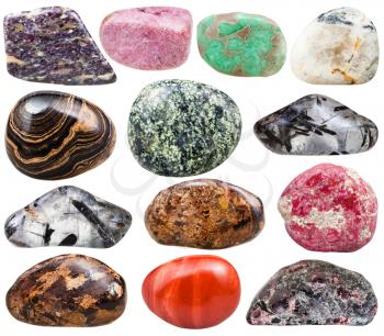 collection of natural mineral tumbled gemstones - bronzite, quartz, variscite, thulite, rosaline, zoisite, red jasper, rhodonite, stromatolite, serpentine, alunite, garnet, almandine, baryte, barite