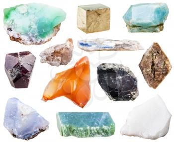 collection of natural mineral crystal gemstones - nephrite, kyanite, garnet (almandine), pyrite, schorl (black tourmaline), topaz, zircon in rock, chalcedony, apatite, chrysoprase, sard, cacholong
