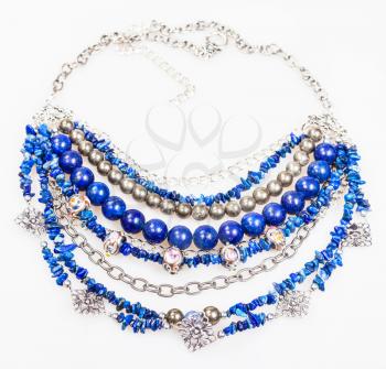 blue necklace from natural gemstones (lapis lazuli - lazurite, pyrite, glass lampwork beads) on white background