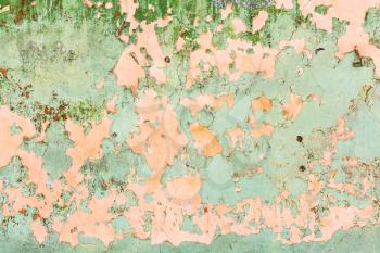 background from peeling paint on wall of old house
