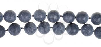 two strings of beads from gray Shungite gem stone isolated on white background