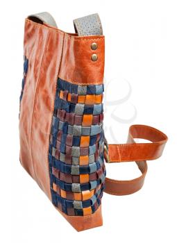 side view of cross-body bag from intertwined leather strips isolated on white background