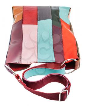 above view of shoulder handbag from multicolored leather pieces isolated on white background