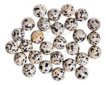 above view of many beads from aplite (dalmatian jasper) gemstone on white background