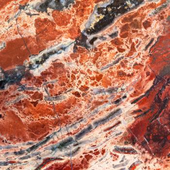 square natural background - texture of brecciated jasper mineral gemstone close up