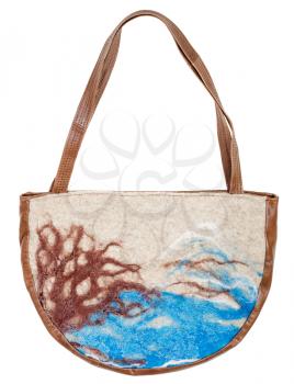 felt and leather handbag decorated of painted landscape isolated on white background