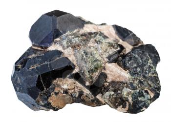 macro shooting of natural rock specimen - black, green diopside gemstones and black spinel gem isolated on white background