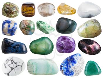 set of rhodonite, heliotrope, citrine, quartz, aventurine, agate, olivine, tiger-eye, sodalite, dumortierite, jadeite, lapis lazuli, aragonite, beryl, beril gemstones isolated on white