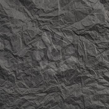 square background from black colour crumpled paper