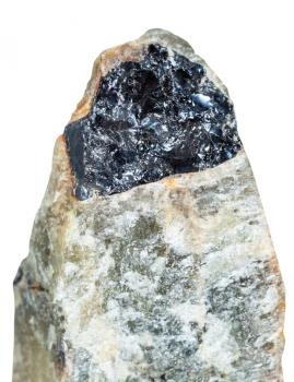 macro shooting of natural mineral stone - black Ilmenite mineral on green Nepheline (nephelite) crystal isolated on white background