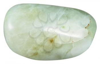 macro shooting of natural mineral stone - polished vesuvianite (idocrase,vesuvian) gemstone isolated on white background