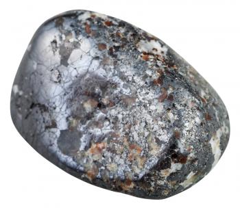 macro shooting of natural mineral stone - polished Magnetite gemstone isolated on white background