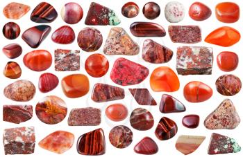 set of red natural mineral stones and gemstones isolated on white background