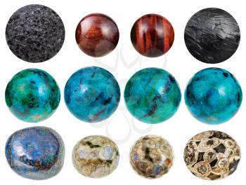 set of balls from natural mineral gemstones - bulls eye (ox eye), pumice, anthracite, chrysocolla, azurite, ocean jasper, rhyolite isolated on white background