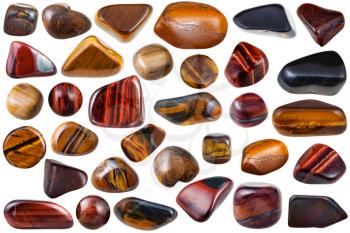 set of various tiger-eye natural mineral stones and gemstones (tigers eye, bull-eye, hawk-eye) isolated on white background