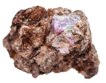 macro shooting of natural mineral stone - corundum crystal on stone of phlogopite isolated on white background