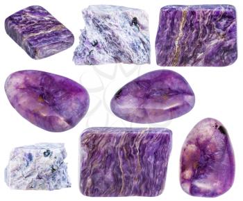 set of various natural mineral stones - charoite polished gemstones and rocks isolated on white background